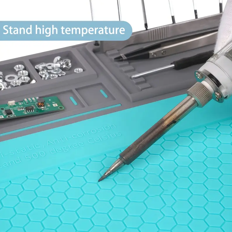 Silicone soldering repair mat with magnetic area, screw grid, anti-slip base, and component storage